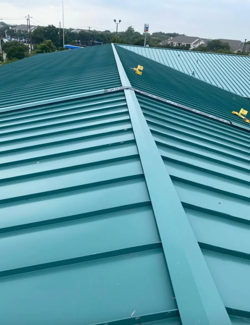 Green commercial metal roof ridge and valley for Metal Roof Repair in Idylwood